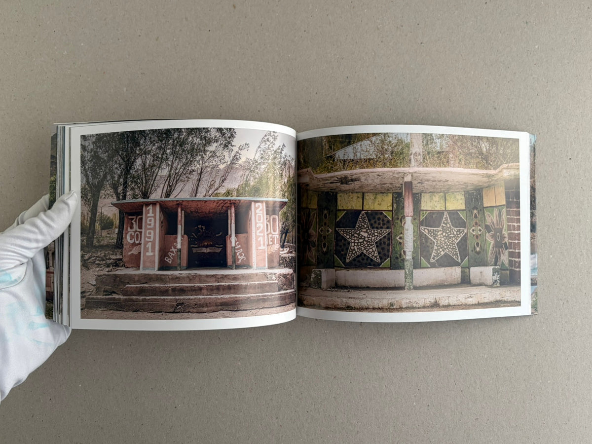 Open spread from Soviet Architectural Design by Hoshino Ai, with a bus stop marked Georgia on the left and a mural detail on the right.