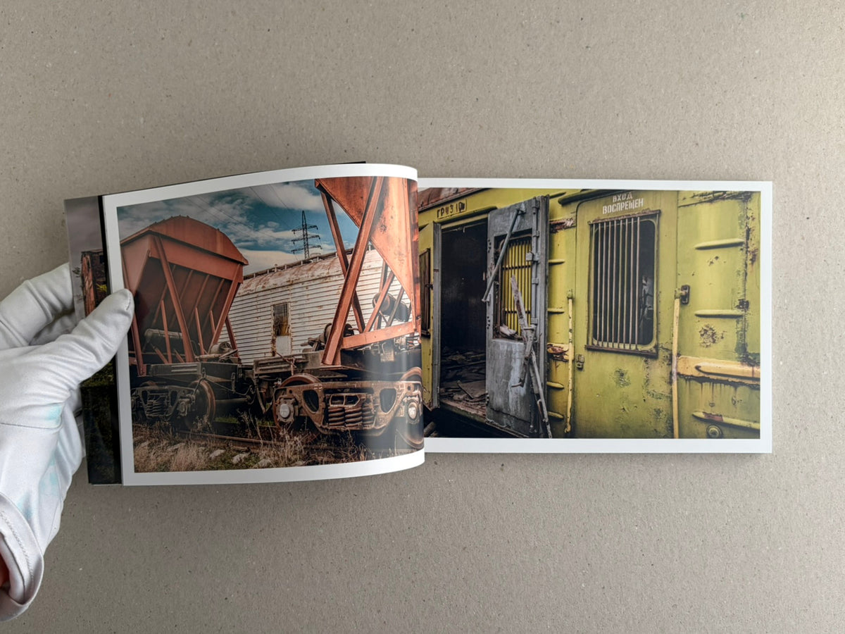 Soviet Transport open spread with a wood-paneled sign page and a narrow train corridor