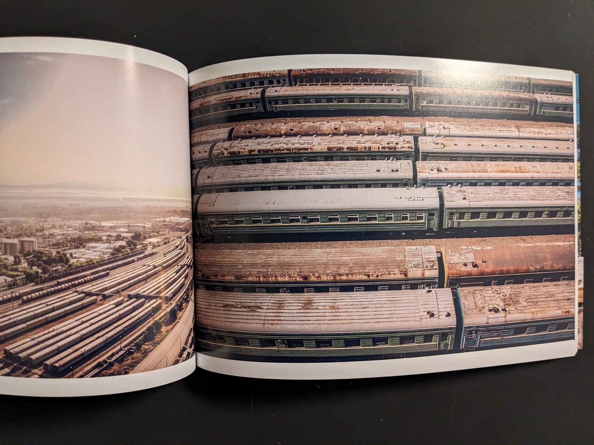 Aerial view of a railway depot with sleeping cars arranged in rows.