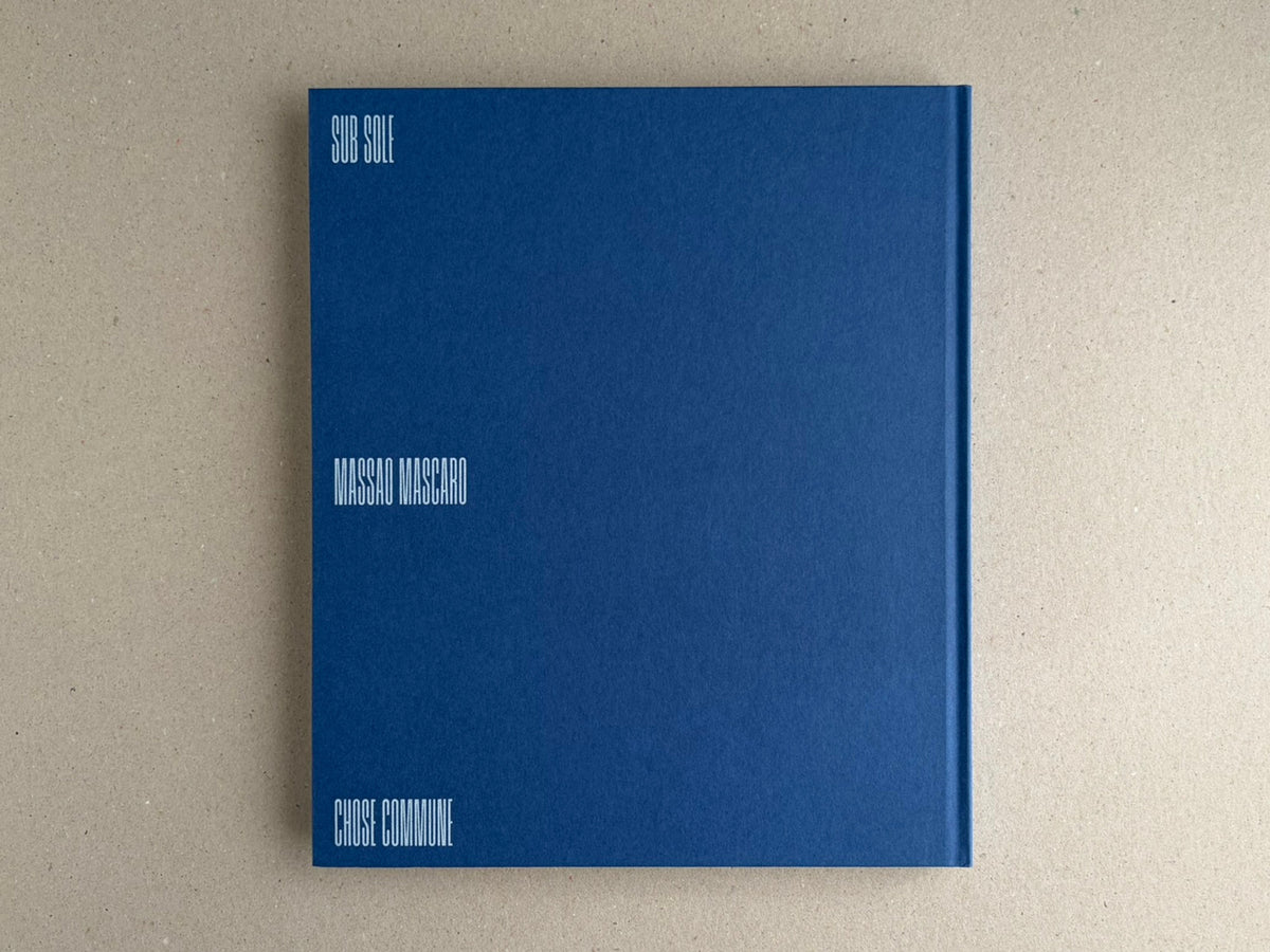 Back cover of Sub Sole by Massao Mascaro, a blue hardcover with white title and author text.
