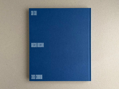 Back cover of Sub Sole by Massao Mascaro, a blue hardcover with white title and author text.