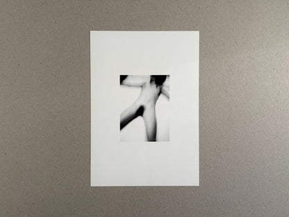 Surveillance – Tsutomu Yamagata, white cover with a small black-and-white abstract photograph centered on the front.