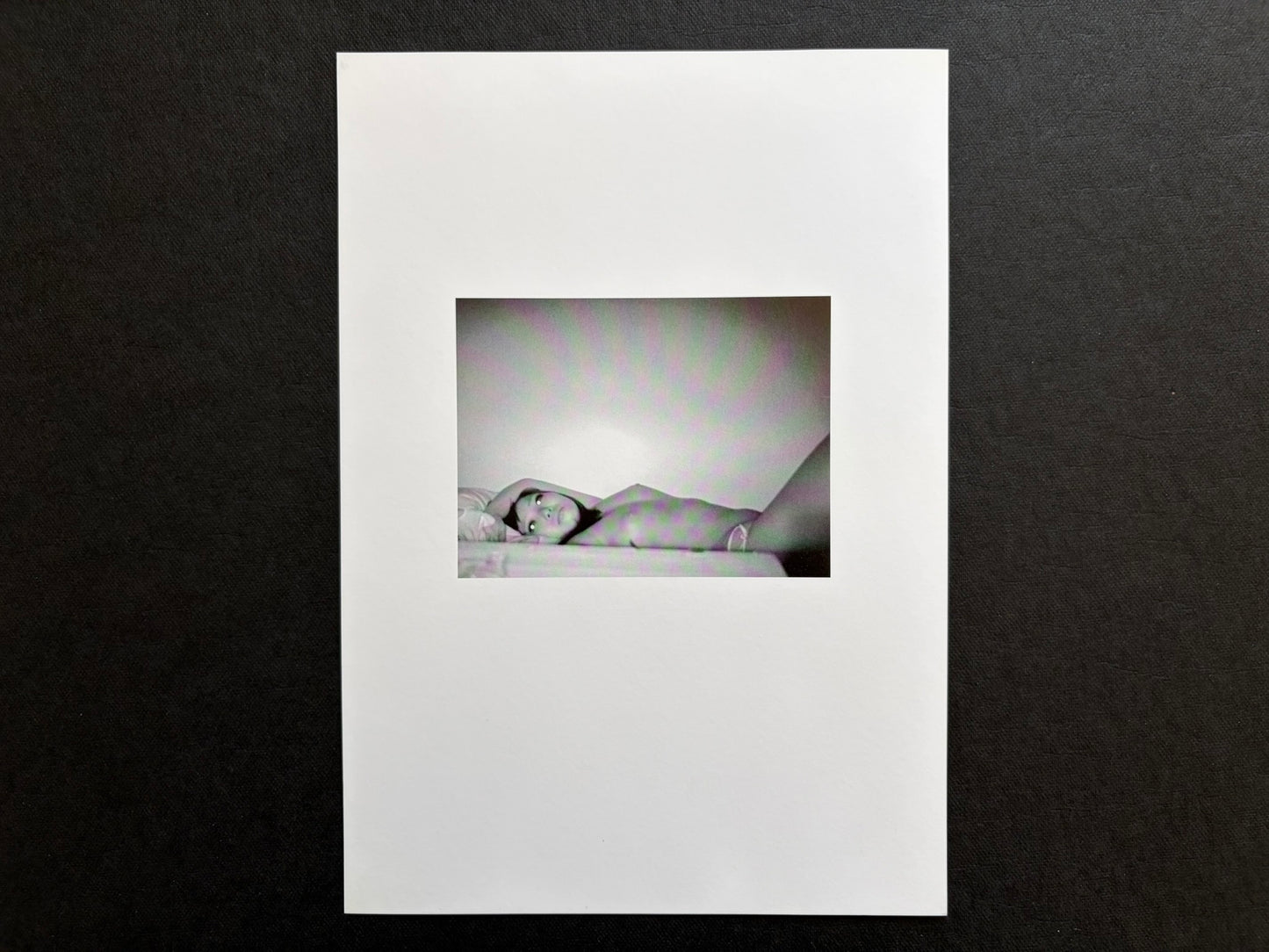 Loose photographic plate from Surveillance showing a reclining infrared portrait.
