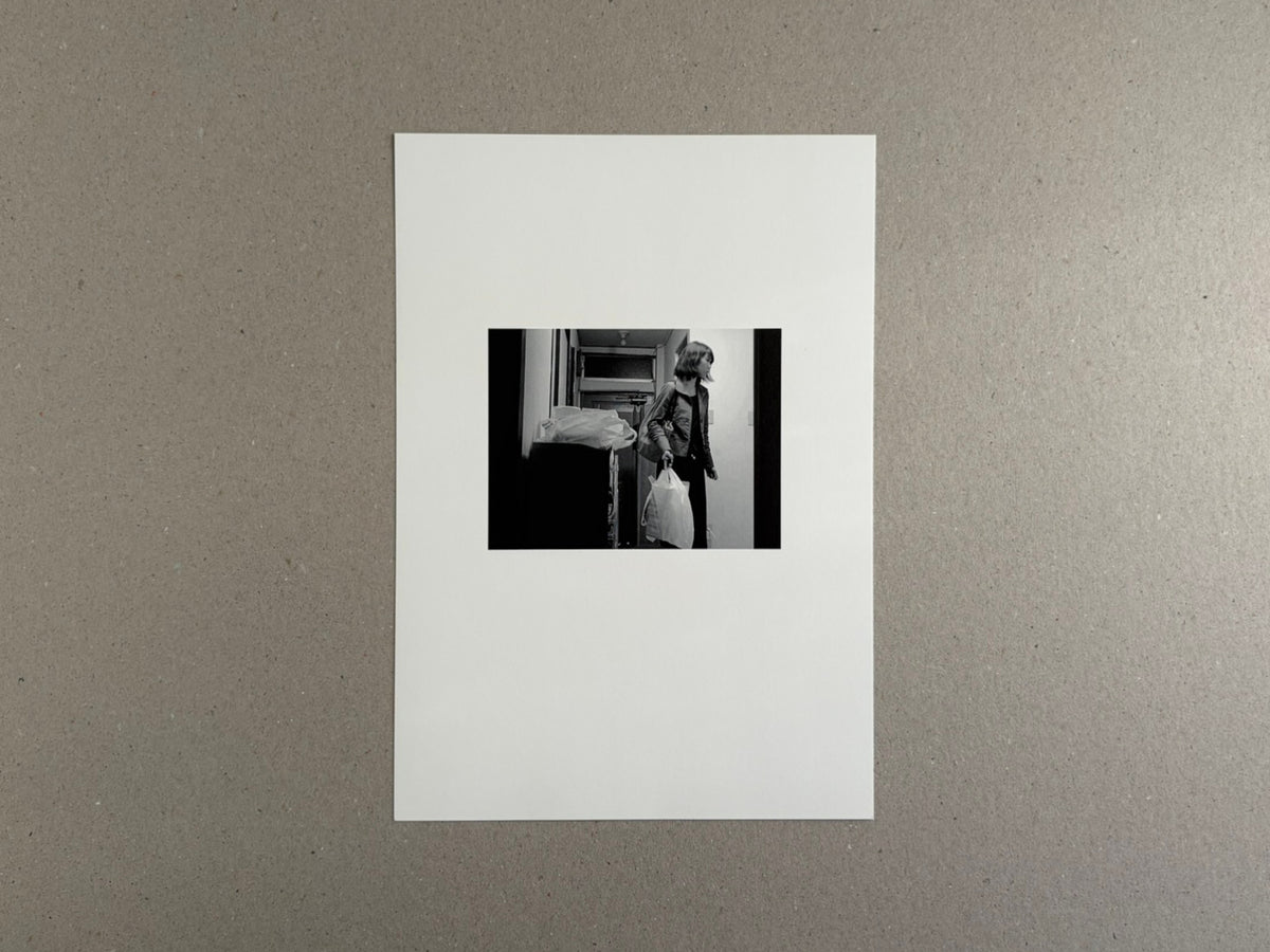 Surveillance – Tsutomu Yamagata, white cover with a small black-and-white photograph centered on the front.