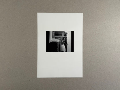 Surveillance – Tsutomu Yamagata, white cover with a small black-and-white photograph centered on the front.