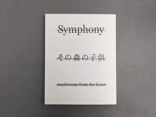 Front cover of Symphony – mushrooms from the forest by Takashi Homma with title and Japanese script