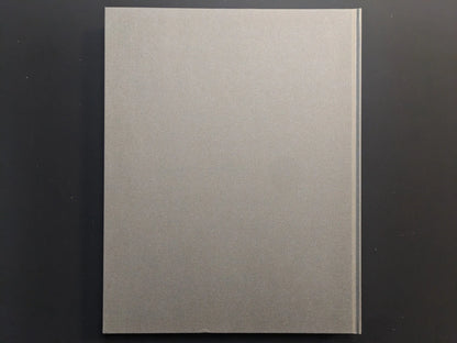 Back cover of Symphony – mushrooms from the forest by Takashi Homma, plain grey textile hardcover