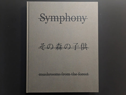 Front cover of Symphony – mushrooms from the forest by Takashi Homma with title and Japanese script