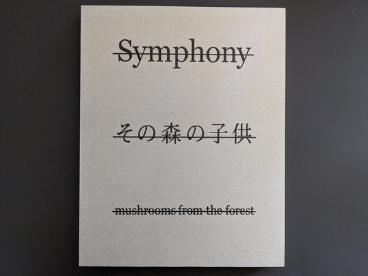Front cover of Symphony – mushrooms from the forest by Takashi Homma with mirrored title and Japanese script