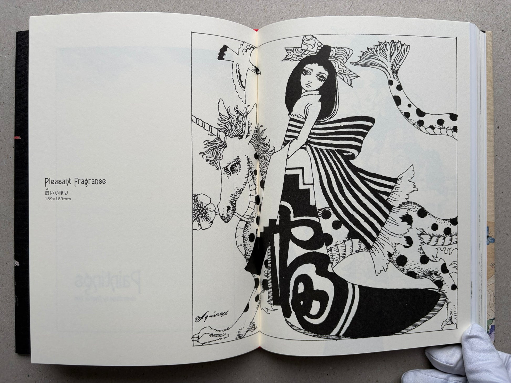 Illustrated spread from Tale of a Castle Keep with a black-and-white drawing of a figure beside a unicorn and a girl in stripes.