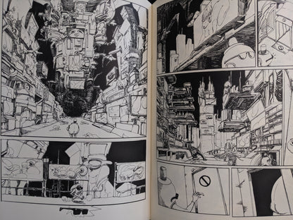 Urban dystopia scene from Terrotic – collapsing city of screens, floating machinery, and grotesque billboards
