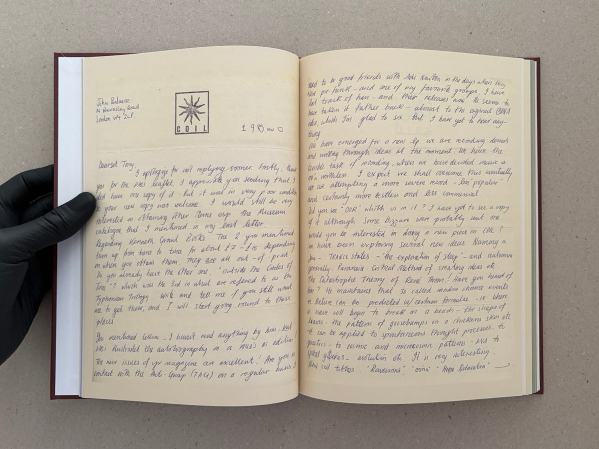 Open book spread showing a facsimile handwritten letter with a Coil logo on the left page and dense handwritten text on the right page.