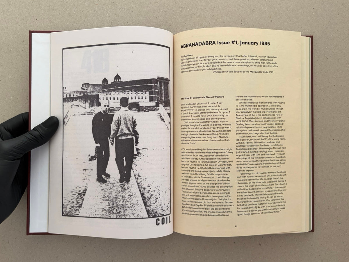 Open spread of The Abrahadabra Letters showing a facsimile page from ABRAHADABRA Issue #1, January 1985, with a black-and-white COIL image on the left and text on the right.