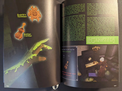 Spread from The Bizarre World of Fake Video Games with inventory items and screenshot of a ghostly hand at a piano in a fake survival horror game.