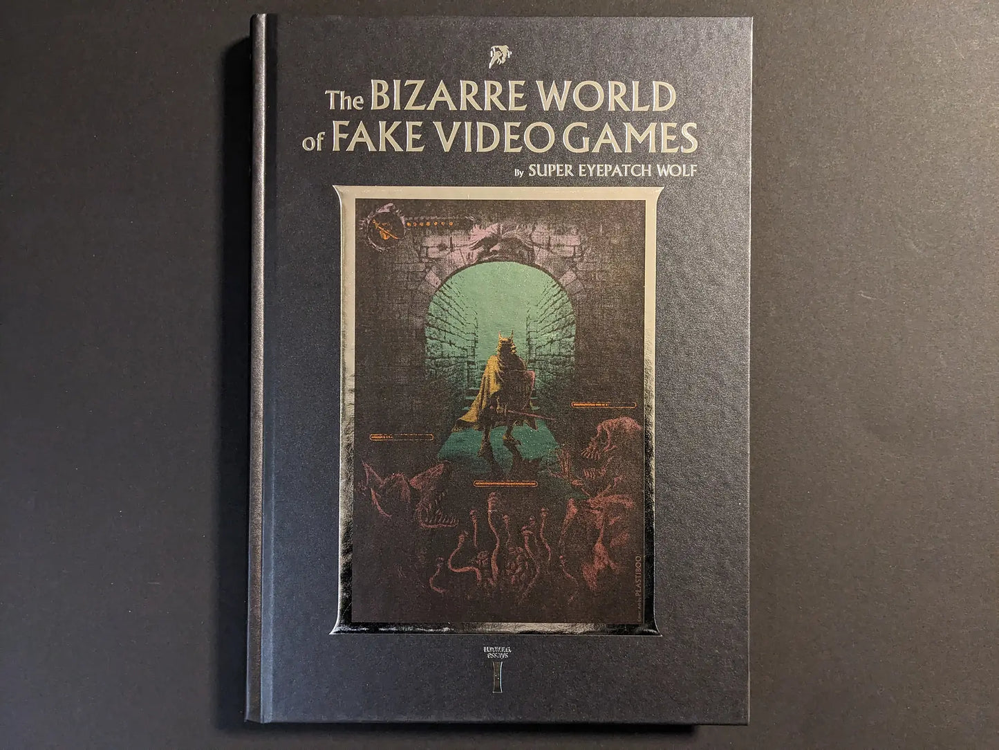 Front cover of The Bizarre World of Fake Video Games by Super Eyepatch Wolf with dungeon artwork framed in metallic foil.