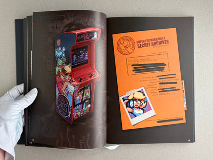 Open spread from The Bizarre World of Fake Video Games showing a full-page arcade cabinet illustration on the left and an orange dossier-style page on the right.