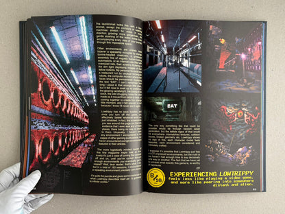 Open spread from The Bizarre World of Fake Video Games showing a Lowtrippy article with pixel-art game screenshots, body text, and a gloved hand holding the book.