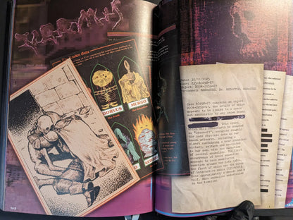 Interior spread from The Bizarre World of Fake Video Games with Vermis-themed artwork, occult trading cards and typewritten case files laid out like secret documents.