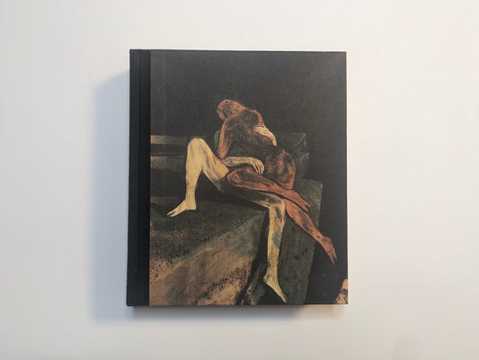 Cover of The Fire That Drank The Shadow – Deluxe Edition by Julia Soboleva, showing two nude figures embracing on concrete steps against a dark cloth background.