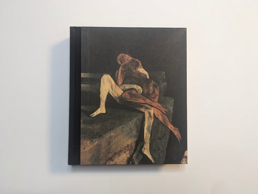 Cover of The Fire That Drank The Shadow – Deluxe Edition by Julia Soboleva, showing two nude figures embracing on concrete steps against a dark cloth background.