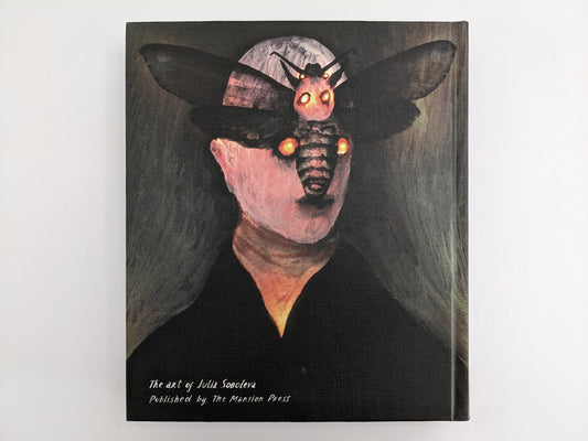 Back cover of The Fire That Drank The Shadow by Julia Soboleva, with a large moth-like figure on a black background.
