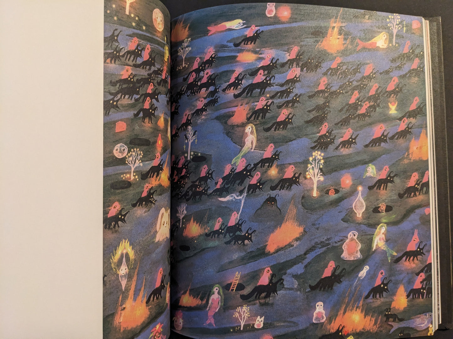 Open spread from The Fire That Drank The Shadow by Julia Soboleva, showing a dark river landscape filled with repeated black creatures and small fires.