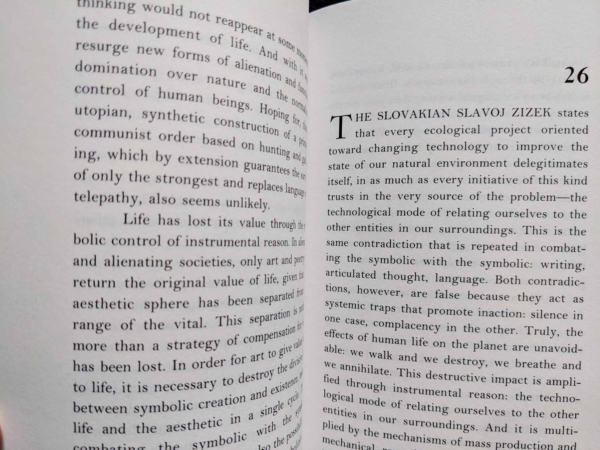 Page from the book referencing Slavoj Žižek and ecological critique of technology and symbolic language.