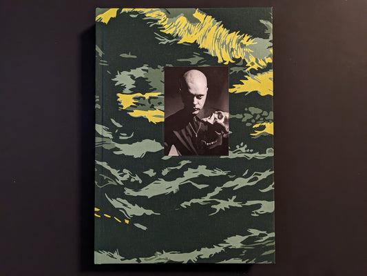Front cover of the clothbound limited edition with a portrait of Genesis P-Orridge.