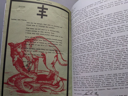 Typewritten letter with red wolf and snake illustration