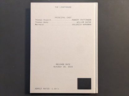 Back cover of The Lighthouse Screenplay Book by Robert Eggers, minimalist typography and film credits.
