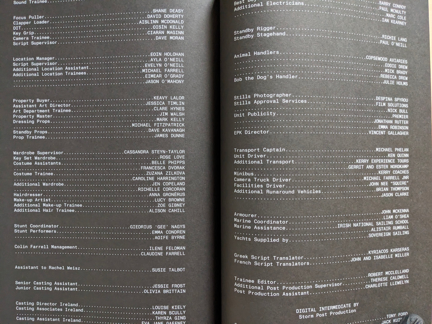 Production credits spread from The Lobster screenplay book printed on dark pages.