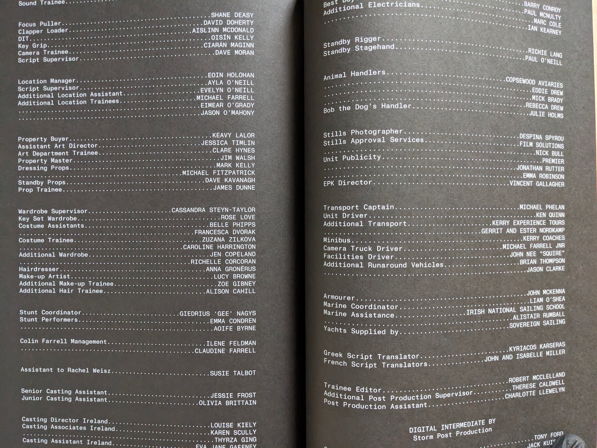Production credits spread from The Lobster screenplay book printed on dark pages.