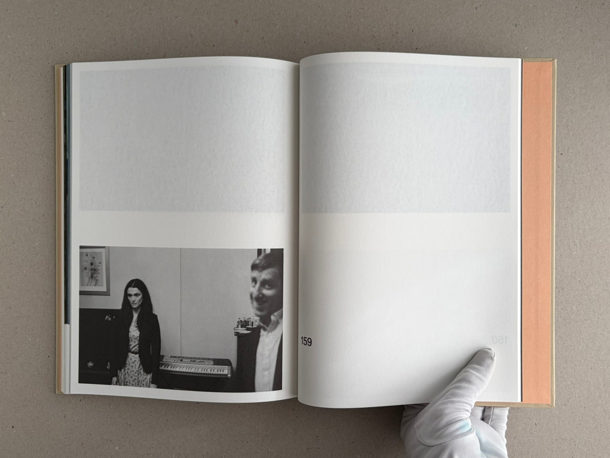 Open spread from The Lobster Screenplay Book by Yorgos Lanthimos, showing a black-and-white film still and page 159.