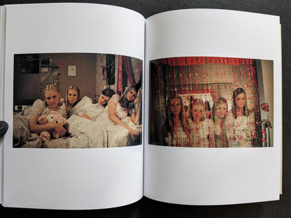 Interior spread showing the Lisbon sisters together in a bedroom in two different images.