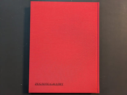 Back view of the red cloth hardcover of “TIBET” by Shinya Arimoto with the Zen Foto Gallery imprint at the bottom.
