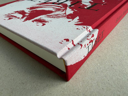 Close-up of the clothbound cover corner and spine of Tibet by Shinya Arimoto