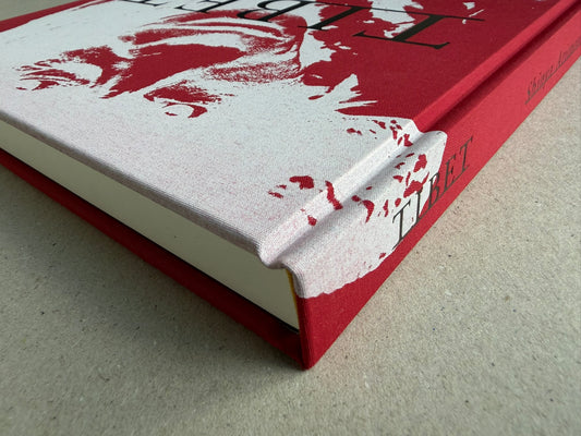 Close-up of the clothbound cover corner and spine of Tibet by Shinya Arimoto