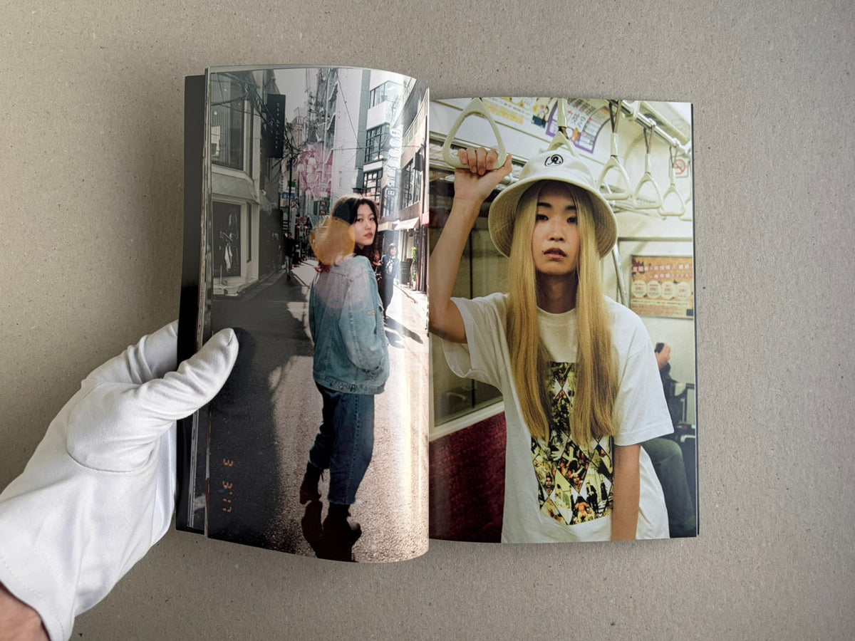 Tokyo Girls by Emily Ashcroft, open spread with a street portrait and an indoor portrait