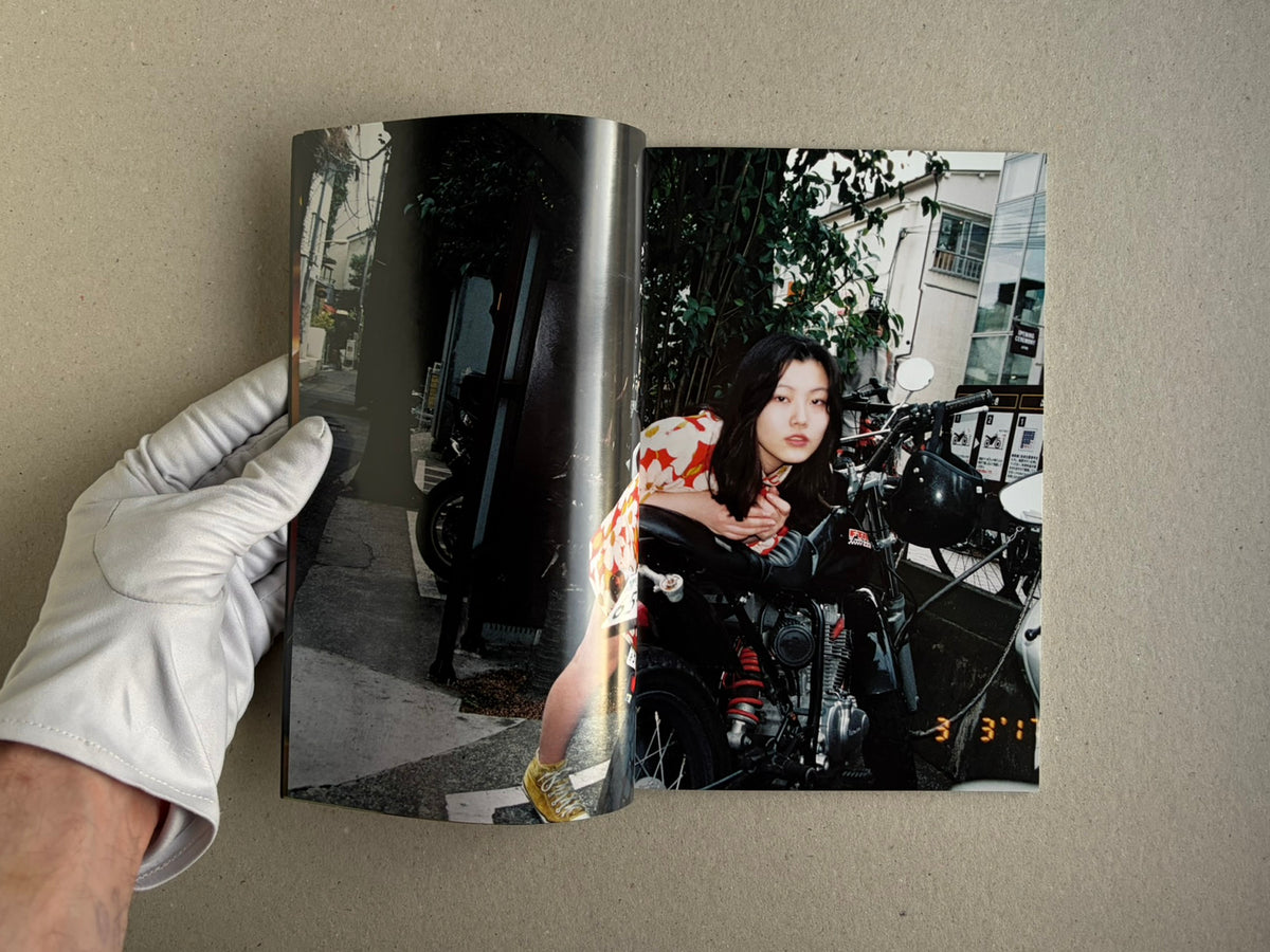 Tokyo Girls by Emily Ashcroft, open spread with a portrait on the right page