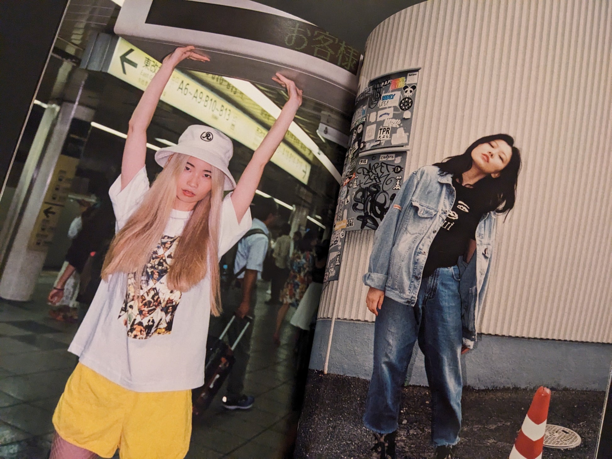 Two women in an urban Tokyo setting, one walking down the street, another posing in a subway station wearing a white hat and yellow shorts.