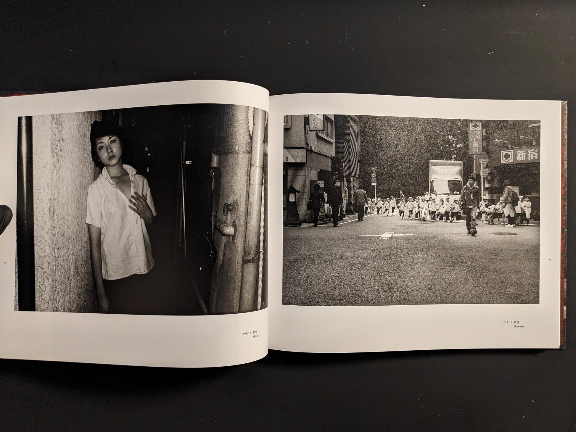 Spread from “Tokyo on the Brink of Sanity” with a crowd crossing a city street and a woman leaning against a wall near exposed pipes in Shinjuku.