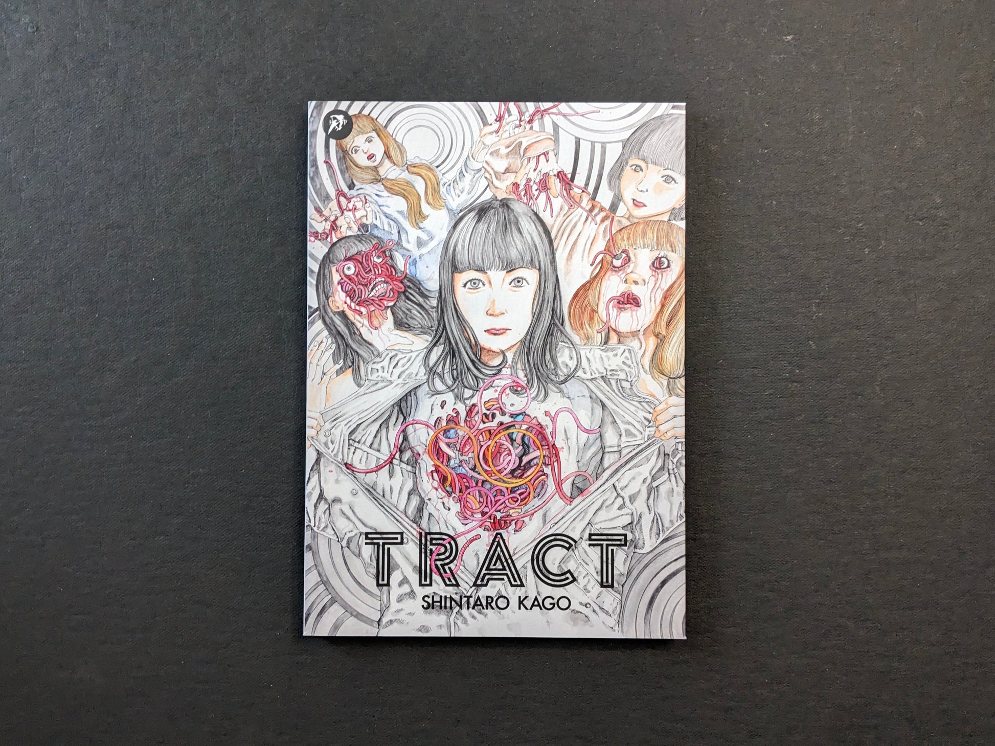 Cover of TRACT pocket edition by Shintaro Kago (Hollow Press), full-color manga artwork.