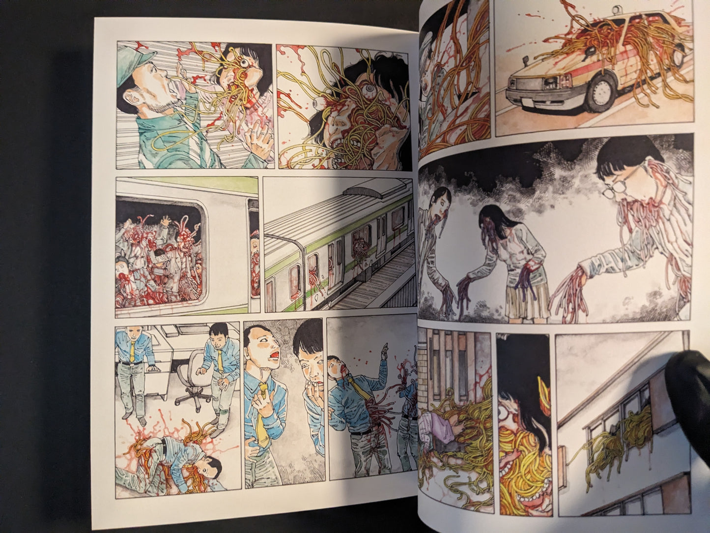 Interior spread with manga panels in transit and city settings.