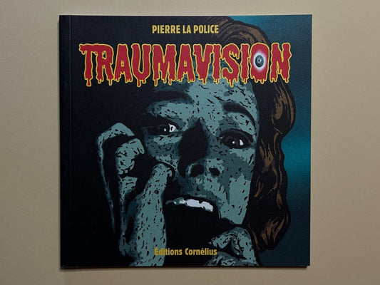 Front cover of Traumavision by Pierre La Police, with the title in dripping red lettering over a blue face illustration and éditions Cornélius at the bottom.