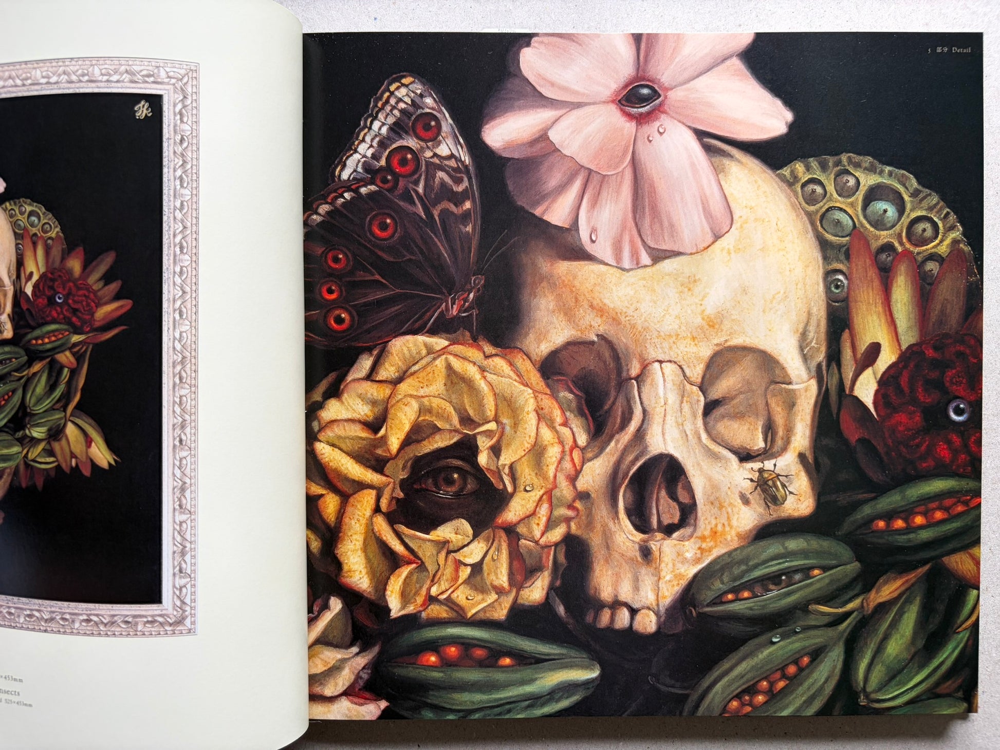 Open spread from VANITAS showing a framed floral skull painting on the right page.