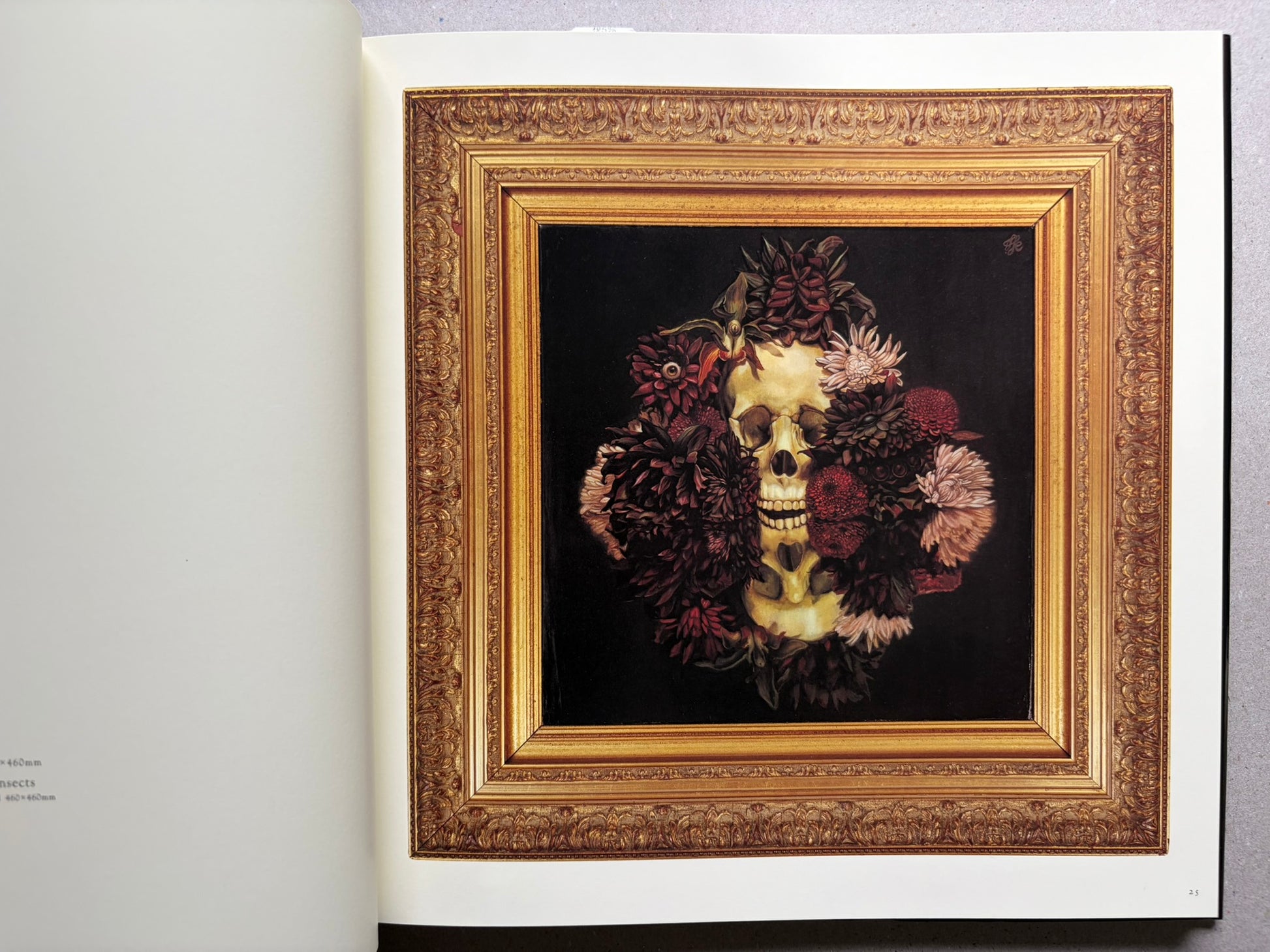 Open spread from VANITAS showing a framed floral animal portrait on the right page.