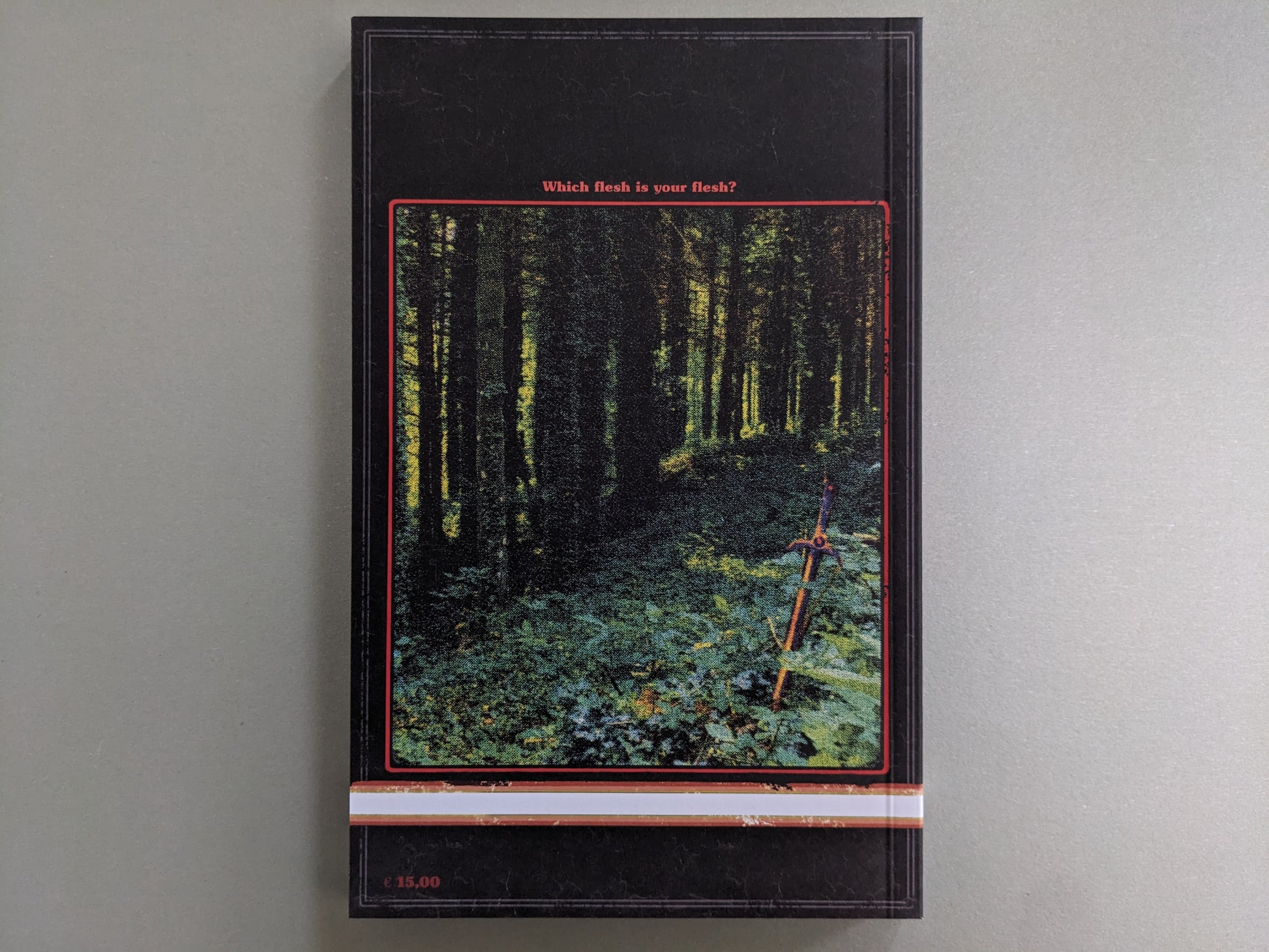 Back cover with a mossy forest, a glowing sword stuck in the ground, and the caption Which flesh is your flesh?