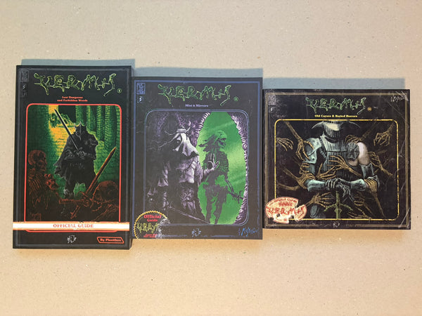 Vermis I–III Regular Edition Set: three Hollow Press books by Plastiboo shown front cover up on a plain surface, with Vermis I, Vermis II, and Vermis III arranged side by side.