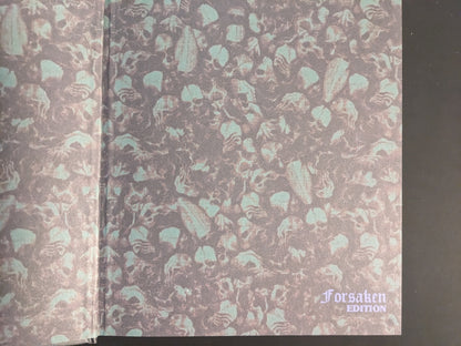 Decorative endpaper with skull pattern from Vermis II – Mist & Mirrors (Forsaken Edition)