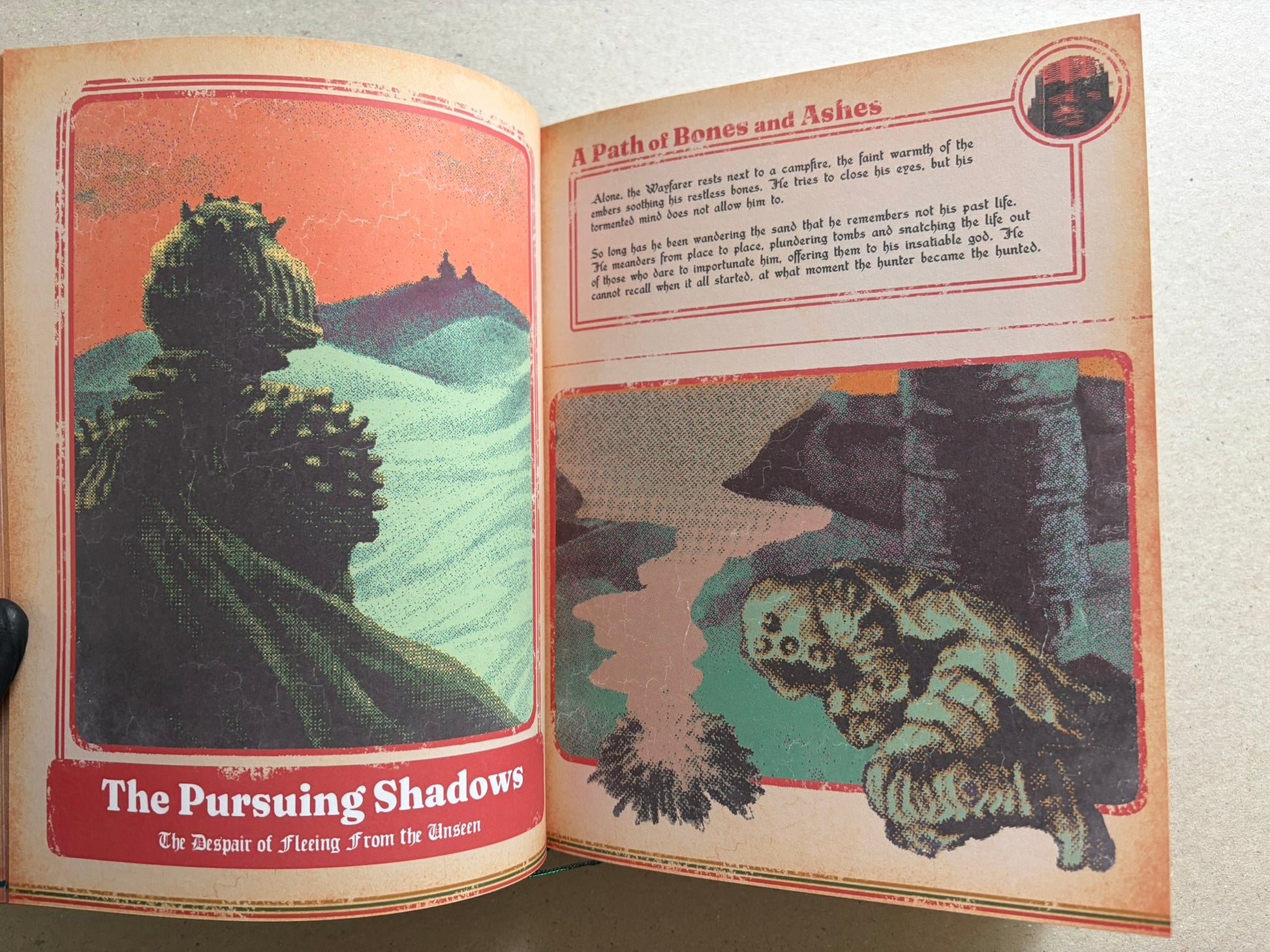 Open spread titled 'A Path of Bones and Ashes', with a large landscape illustration on the left and a text panel above a smaller scene on the right.